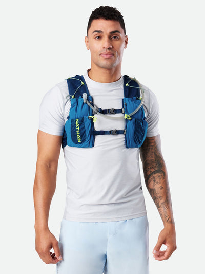 color:Deep Blue/Safety Yellow||view:SKU image back||seo:Nathan VaporAir 3.0 7 Liter Men's Hydration Pack - Deep Blue/Safety Yellow - On Model - Front View