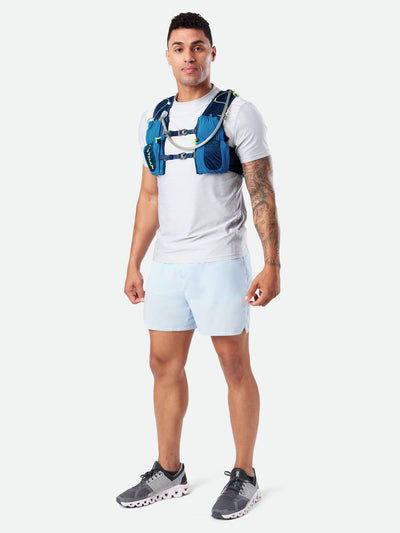 color:Deep Blue/Safety Yellow||seo:Nathan VaporAir 3.0 7 Liter Men's Hydration Pack - Deep Blue/Safety Yellow - On Model - Three Quarter View