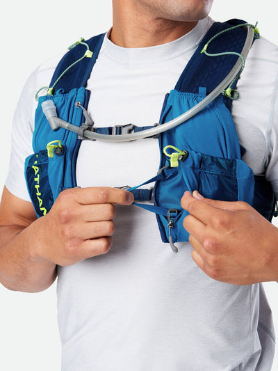 color:Deep Blue/Safety Yellow||seo:Nathan VaporAir 3.0 7 Liter Men's Hydration Pack - Deep Blue/Safety Yellow - On Model - Model Tightening Straps For Better Fit