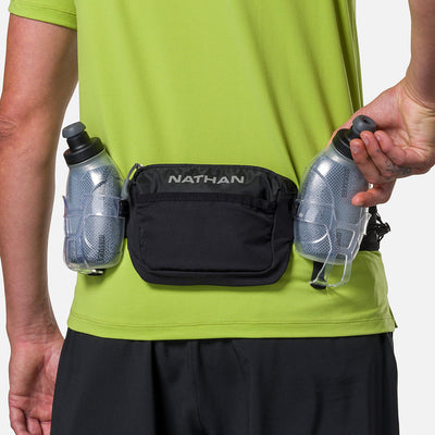 color:Black/Reflective Silver||view:sku image back||seo:Nathan TrailMix Plus Insulated Hydration Waist Belt 3.0 - Black/Reflective Silver - Pulling Flask From Carrier