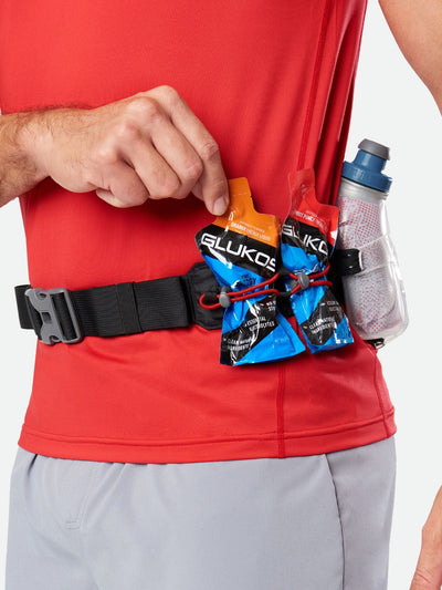 color:Black/Deep Blue||seo:Nathan TrailMix Plus Insulated Hydration Belt 3.0 - Black/Deep Blue - On Model - Detail View of Elastic Keepers Holding Glukos Energy Gels (Fruit Punch & Orange Flavor)