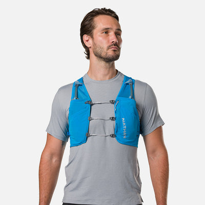 color:Electric Blue/Reflective Silver||view:sku image back||seo:Nathan Pinnacle Breeze 4 Liter Unisex Hydration Race Vest - Electric Blue/Reflective Silver - Male Runner Front View