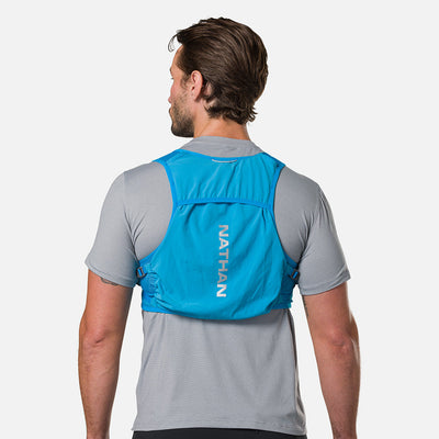 color:Electric Blue/Reflective Silver||seo:Nathan Pinnacle Breeze 4 Liter Unisex Hydration Race Vest - Electric Blue/Reflective Silver - Male Runner Back View