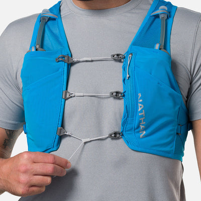 color:Electric Blue/Reflective Silver||seo:Nathan Pinnacle Breeze 4 Liter Unisex Hydration Race Vest - Electric Blue/Reflective Silver - Model Adjusting Sternum Slider Cord System