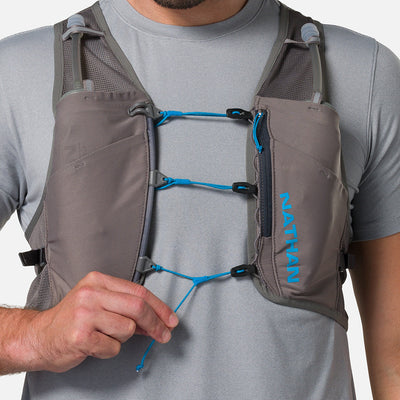 color:Charcoal/Electric Blue||seo:Nathan Pinnacle Breeze 4 Liter Unisex Hydration Race Vest - Charcoal/Electric Blue - Model Adjusting Sternum Slider Cord System