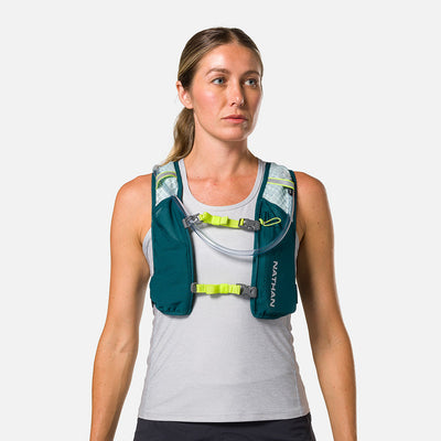 color:Deep Teal/Reflective Silver||view:sku image back||seo:Nathan QuickStart 3.0 4 Liter Hydration Pack - Deep Teal/Reflective Silver - On Model - Front View