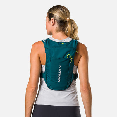 color:Deep Teal/Reflective Silver||seo:Nathan QuickStart 3.0 4 Liter Hydration Pack - Deep Teal/Reflective Silver - On Model - Back View