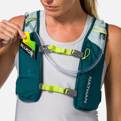 color:Deep Teal/Reflective Silver||seo:Nathan QuickStart 3.0 4 Liter Hydration Pack - Deep Teal/Reflective Silver - Model Pulling Glukos Liquid Energy Liquid Gel (Lemon Lime Flavor ) from Pouch