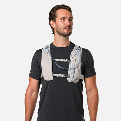 color:Vapor Grey/Deep Blue||view:sku image back||seo:Nathan QuickStart 3.0 4 Liter Hydration Pack - Vapor Grey/Deep Blue - On Model - Front View