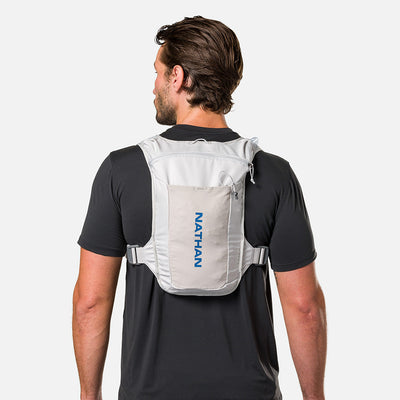 color:Vapor Grey/Deep Blue||seo:Nathan QuickStart 3.0 4 Liter Hydration Pack - Vapor Grey/Deep Blue - On Model - Back View