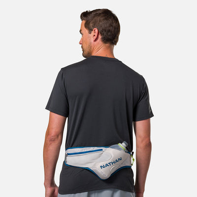 color:Vapor Grey/Sailor Blue||seo:Nathan Peak Hydration Waist Pack - Vapor Grey/Sailor Blue - On Model - Back of Waist Pack