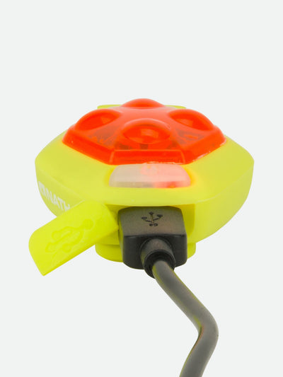 color:Safety Yellow||seo:Nathan HyperBrite RX Strobe Rechargeable LED Clip Light - Safety Yellow - Detail Shot of USB Plugged Into Charging Port (Charging Device)