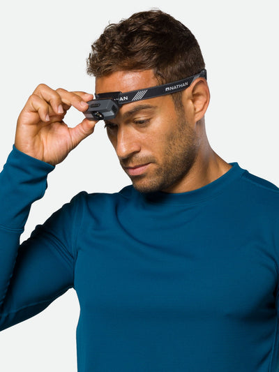 Nathan Neutron Fire RX 2.0 Runner's Headlamp – Charcoal – On Model – Model Tilting Headlamp Down
