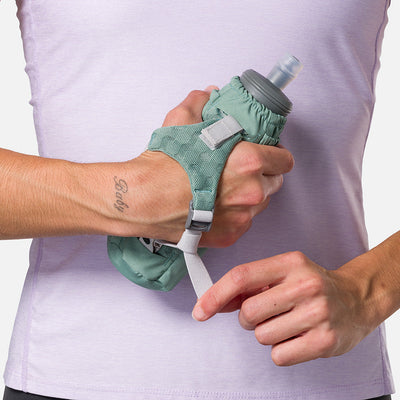 color:Sage Green/Reflective Silver||seo:Nathan Pinnacle Soft 14oz Flask Handheld - Sage Green/Reflective Silver - Model Tightening Strap for Better Fit