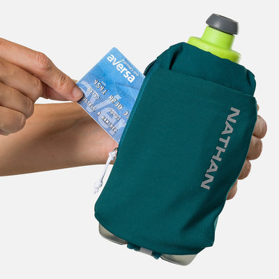 color:Deep Teal/Reflective Silver||seo:Nathan SpeedDraw 2 18oz Flask - Deep Teal/Reflective Silver - Model Pulling Credit Card from Zippered Pouch