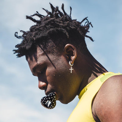 Youth Football Player Wearing Shock Doctor Max AirFlow Black Lux Lipguard and Mouthguard