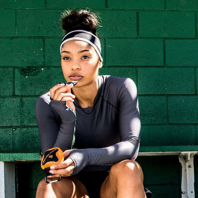 Athlete pulling mouthguard out of Shock Doctor Mouthguard Case