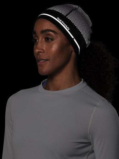 Nathan HyperNight Reflective Ponytail Safety Beanie - Black - On Model - Front View (Reflective Detail)