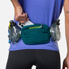 color:Deep Teal/Finish Lime||seo:Nathan TrailMix Plus Hydration Belt 3.0 - Deep Teal/Finish Lime - Model Pulling Cell Phone From Pocket
