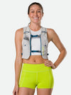 color:Vapor Grey||view:sku image back||seo:Nathan Pinnacle FeatherLite 1.5 Liter Unisex Hydration Vest - Vapor Grey -  Female Runner Front View