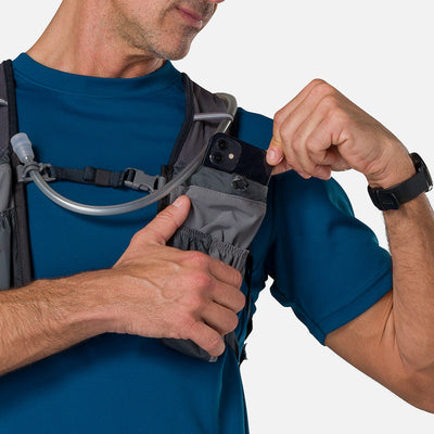 color:Charcoal/Reflective Silver||seo:Nathan TrailMix 2.0 12 Liter Unisex Hydration Pack - Charcoal/Reflective Silver - Male Runner Pulling iPhone From Front Storage Pocket