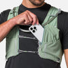 color:Sage Green/Reflective Silver||seo:Nathan Pinnacle Pro 12 Liter Unisex Hydration Race Vest - Sage Green/Reflective Silver - Male Runner Pulling Cell Phone From Front Storage Pocket