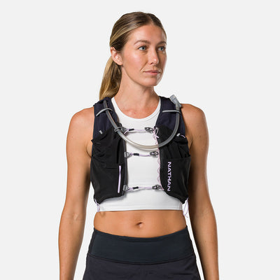 color:Black/Lilac Breeze||view:sku image back||seo:Nathan Pinnacle Pro 12 Liter Women's Hydration Race Vest - Black/Lilac Breeze - Female Runner Front View
