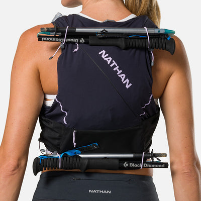 color:Black/Lilac Breeze||seo:Nathan Pinnacle Pro 12 Liter Women's Hydration Race Vest - Black/Lilac Breeze - Detail View of 4 Pole Keepers Located at Top and Bottom of Vest