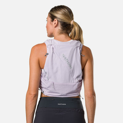 color:Lilac Breeze/Reflective Silver||seo:Nathan Pinnacle Pro 12 Liter Women's Hydration Race Vest - Lilac Breeze/Reflective Silver - Female Runner Back View