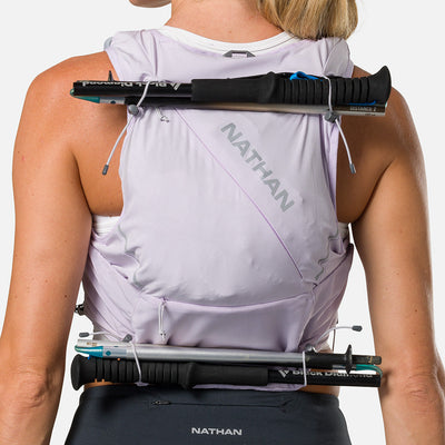 color:Lilac Breeze/Reflective Silver||seo:Nathan Pinnacle Pro 12 Liter Women's Hydration Race Vest - Lilac Breeze/Reflective Silver - Detail View of 4 Pole Keepers Located at Top and Bottom of Vest