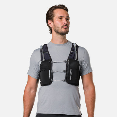 color:Black/Reflective Silver||view:sku image back||seo:Nathan Pinnacle Pro 6 Liter Unisex Hydration Race Vest - Black/Reflective Silver - Male Runner Front View