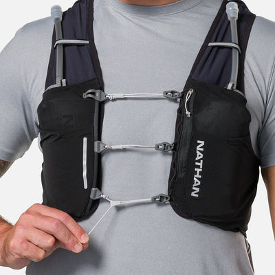 color:Black/Reflective Silver||seo:Nathan Pinnacle Pro 6 Liter Unisex Hydration Race Vest - Black/Reflective Silver - Model Adjusting Sternum Slider Cord System