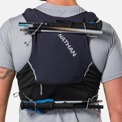 color:Black/Reflective Silver||seo:Nathan Pinnacle Pro 6 Liter Unisex Hydration Race Vest - Black/Reflective Silver - Detail View of 4 Pole Keepers Located at Top and Bottom of Vest