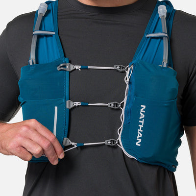 color:Sailor Blue/Reflective Silver||seo:Nathan Pinnacle Pro 6 Liter Unisex Hydration Race Vest - Sailor Blue/Reflective Silver - Model Adjusting Sternum Slider Cord System