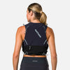 color:Black/Surf Spray||seo:Nathan Pinnacle Pro 6 Liter Women's Hydration Race Vest - Black/Surf Spray - Female Runner Pulling iPhone From Front Storage Pocket