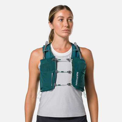 color:Deep Teal/Reflective Silver||view:sku image back||seo:Nathan Pinnacle Pro 6 Liter Women's Hydration Race Vest - Deep Teal/Reflective Silver - Female Runner Front View
