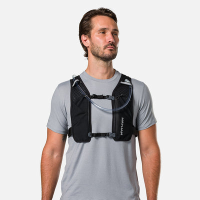color:Black/Reflective Silver||view:sku image back||seo:Nathan QuickStart 3.0 6 Liter Hydration Pack - Black/Reflective Silver - On Model - Front View