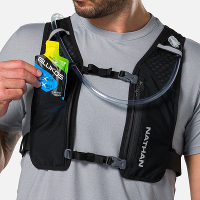 color:Black/Reflective Silver||seo:Nathan QuickStart 3.0 6 Liter Hydration Pack - Black/Reflective Silver - Model Pulling Glukos Liquid Energy Liquid Gel (Lemon Lime Flavor ) from Pouch