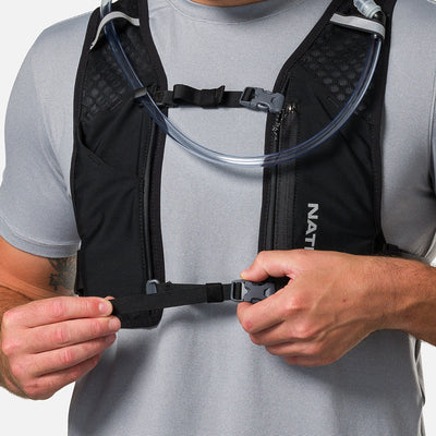 color:Black/Reflective Silver||seo:Nathan QuickStart 3.0 6 Liter Hydration Pack - Black/Reflective Silver - On Model - Model Tightening Sternum Straps For Better Fit
