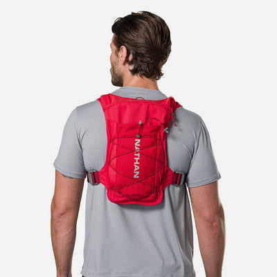 color:Ribbon Red/Reflective Silver||seo:Nathan QuickStart 3.0 6 Liter Hydration Pack - Ribbon Red/Reflective Silver - On Model - Back View