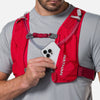 color:Ribbon Red/Reflective Silver||seo:Nathan QuickStart 3.0 6 Liter Hydration Pack - Ribbon Red/Reflective Silver - On Model - Model Pulling iPhone From Front Zippered Pocket