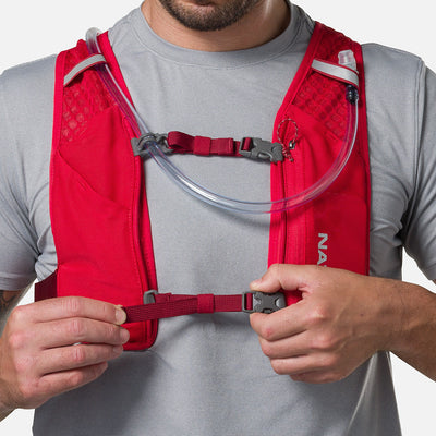 color:Ribbon Red/Reflective Silver||seo:Nathan QuickStart 3.0 6 Liter Hydration Pack - Ribbon Red/Reflective Silver - On Model - Model Tightening Sternum Straps For Better Fit