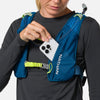 color:Sailor Blue/Reflective Silver||seo:Nathan QuickStart 3.0 6 Liter Hydration Pack - Sailor Blue/Reflective Silver - On Model - Model Pulling iPhone From Front Zippered Pocket
