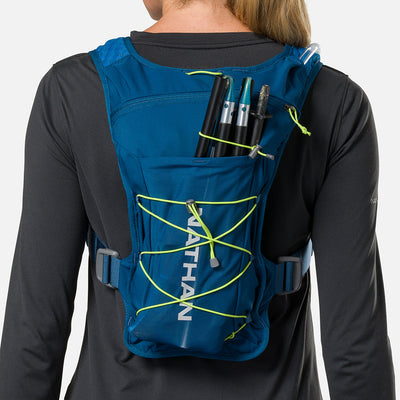 color:Sailor Blue/Reflective Silver||seo:Nathan QuickStart 3.0 6 Liter Hydration Pack - Sailor Blue/Reflective Silver - On Model - Large back expandable mesh pocket perfect for clothes, gear and other larger essentials, plus elastic pole keeper