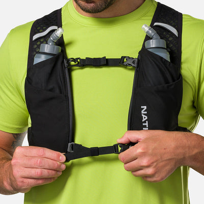 color:Black/Reflective Silver||seo:Nathan QuickStart 3.0 4 Liter Soft Flask Hydration Pack - Black/Reflective Silver - On Model - Model Tightening Sternum Straps For Better Fit