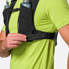 color:Black/Reflective Silver||seo:Nathan QuickStart 3.0 4 Liter Soft Flask Hydration Pack - Black/Reflective Silver - On Model - Model Adjusting Wide Side Straps For a Secure No Bounce Fit