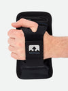 Nathan Vista Handheld Phone Carrier - On Model - Gripping Carrier Through Sleeve View 1