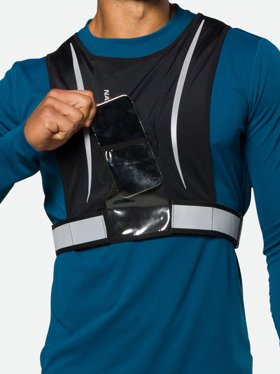 Nathan Hypernight Reflective Stash Vest – Black – On Model – Pulling Cell Phone From Front Storage Pocket