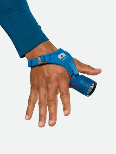 Nathan Polaris 400RX Runner’s Hand Torch – Deep Blue – On Model – Strap on Hand - Open Palm (Back of Hand)