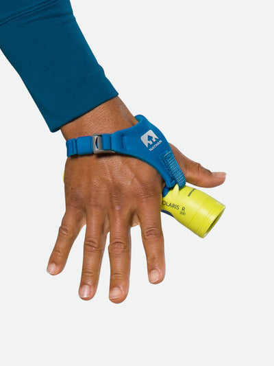 Nathan Polaris 200R Runner’s Hand Torch – Safety Yellow/Blue – On Model – Strap on Hand - Open Palm (Back of Hand)